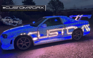 LED Car displaying CUSTOMWORX Logo