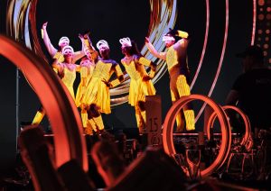 LED dance show performed in Blackout with Table decorations synced to the music